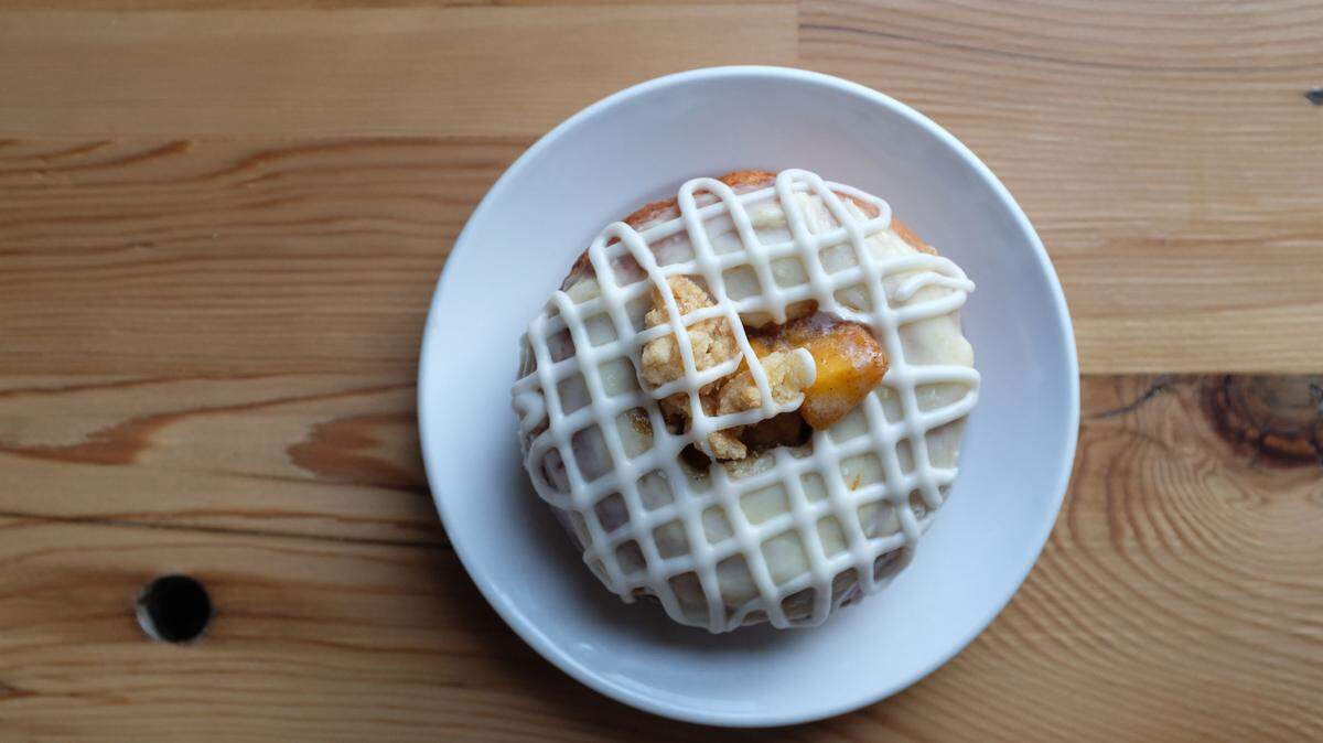 Mud Pie recently brought back its popular cakes and doughnuts including a peach cobbler doughnut.