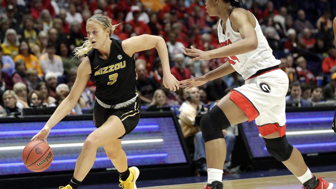 Missouri guard Sophie Cunningham tried to drive around Georgia forward Malury Bates in an SEC tournament game on Friday night in Nashville, Tenn.