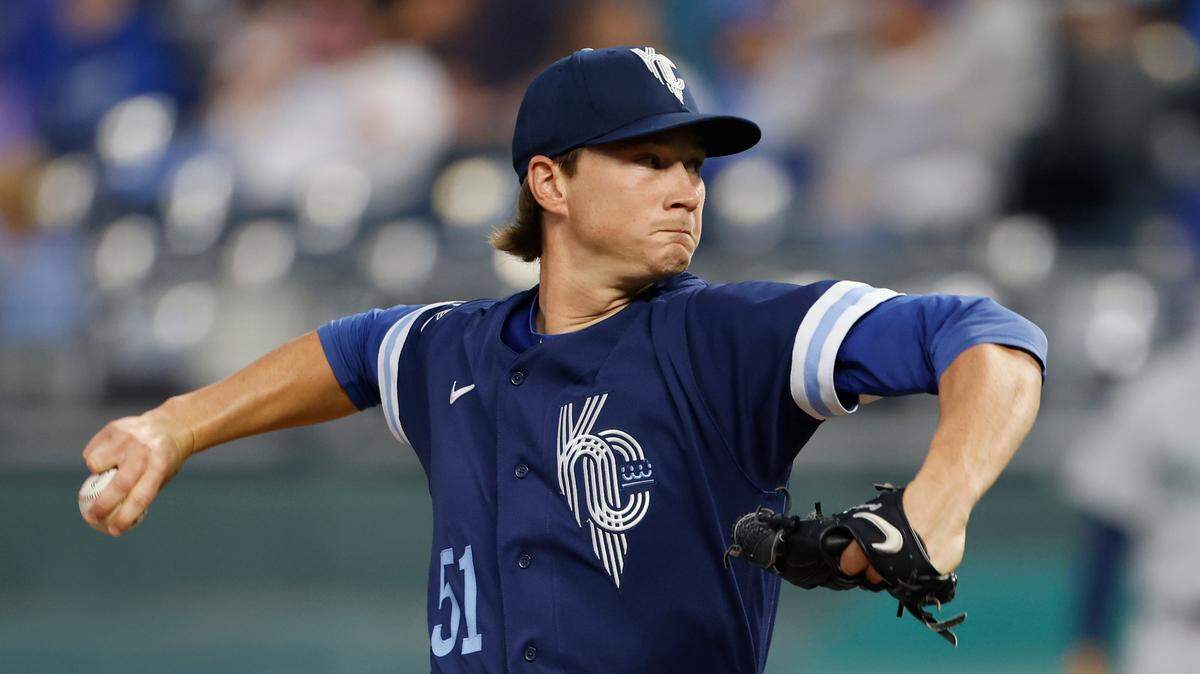 Kansas City Royals starting pitcher Brady Singer throws to a Seattle Mariners batter during the first inning at Kauffman Stadium in Kansas City.