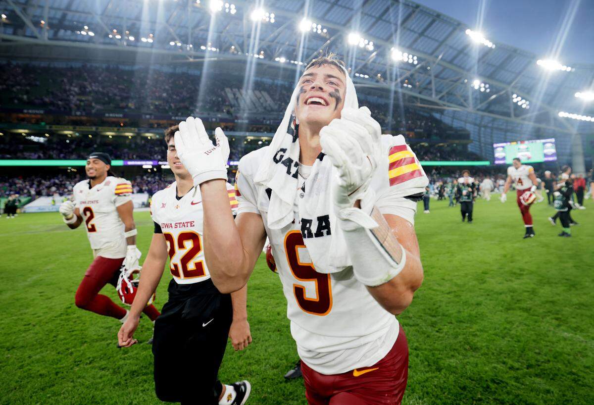 Iowa State players celebrate after defeating Kansas State during the Aer Lingus Classic at Aviva Stadium in Dublin on Aug. 23, 2025.