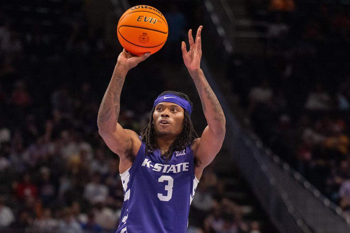 Kansas State Wildcats guard CJ Jones (3) takes a three point shot in the first half of the Wildcats first round game vs. the BYU Cougars in the Big 12 Men's Basketball Tournament, on Tuesday, March 10, 2026, at T-Mobile Center. The Wildcats lost to BYU, 105-91.