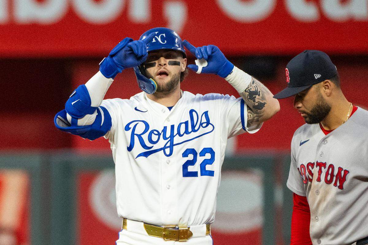 Kansas City Royals catcher Carter Jensen (22) celebrates after hitting a double against the Boston Red Sox on Tuesday, May 19, 2026, at Kauffman Stadium.