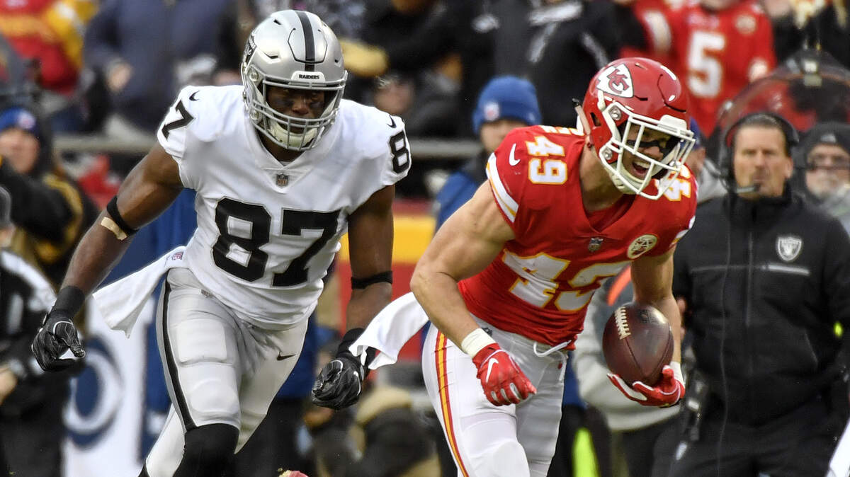 Kansas City Chiefs defensive back Daniel Sorensen intercepted a pass intended for Oakland Raiders tight end Jared Cook and ran it back for a touchdown in the first quarter during Sunday’s football game on December 30, 2018 at Arrowhead Stadium in Kansas City, Mo.