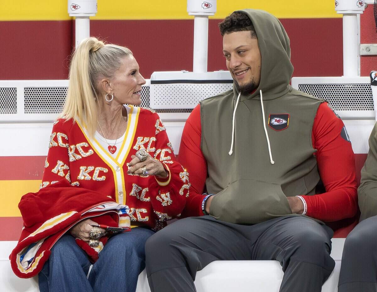 Tammy Reid, wife of Kansas City Chiefs coach Andy Reid, chatted with quarterback Patrick Mahomes before the “Monday Night Football” game at GEHA Field at Arrowhead Stadium on Oct. 27, 2025.