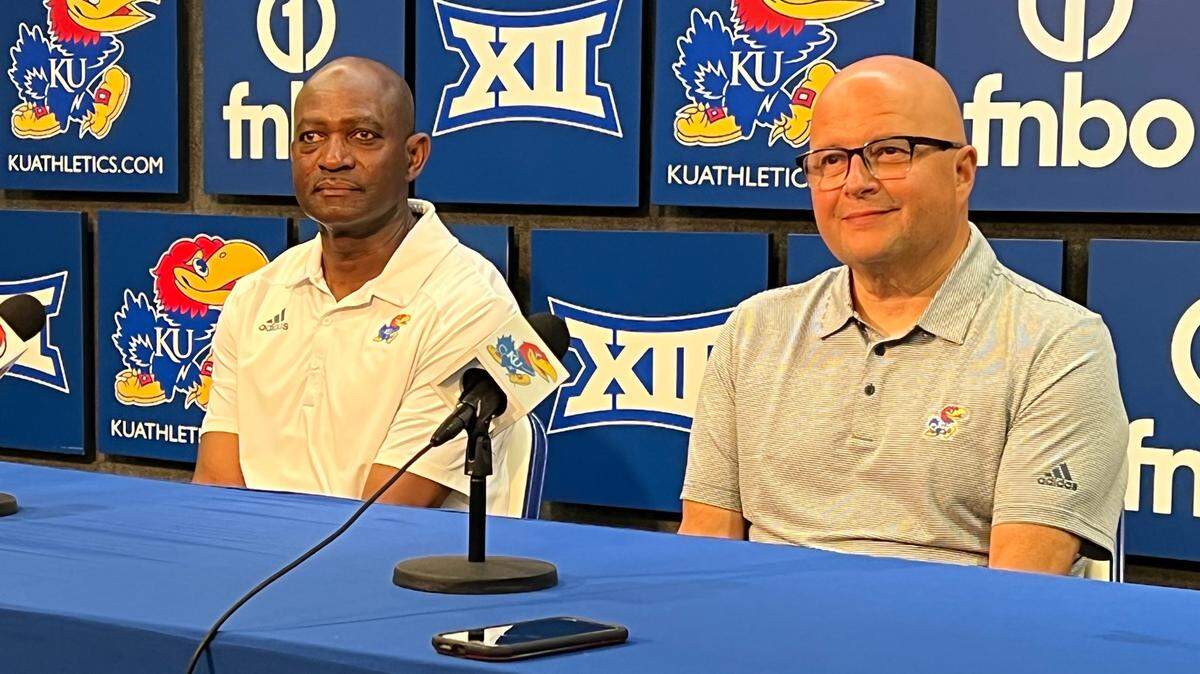 Kansas track coach Stanley Redwine, left, and Kansas Relays meet director Tim Byers held a news conference Wednesday to discuss the 100th Relays, set for Thursday through Saturday at Rock Chalk Park.