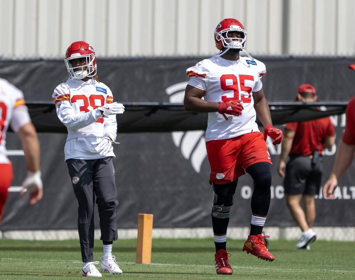Chiefs cornerback L'Jarius Sneed (38) warms up with defensive tackle Chris Jones (95) during Day 2 of minicamp practice at the team’s facility in Kansas City on Wednesday, June 10, 2026.