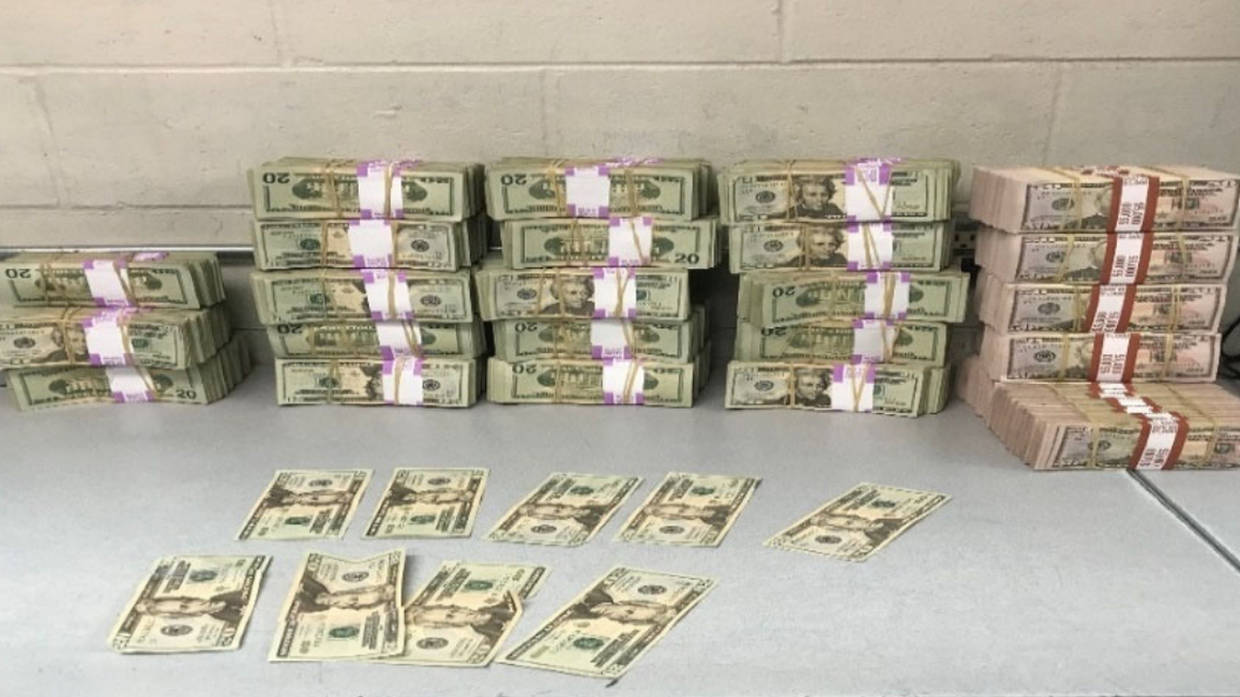 The driver is accused of stealing money from Michigan banks and credit unions.