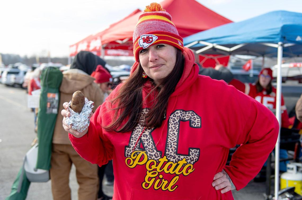 Nicki Conrad, aka “KC Chiefs Potato Girl,” poses for a photo while tailgating outside Arrowhead Stadium before the Kansas City Chiefs and Cincinnati Bengals AFC Championship football game on Sunday, Jan. 29, 2023, in Kansas City.