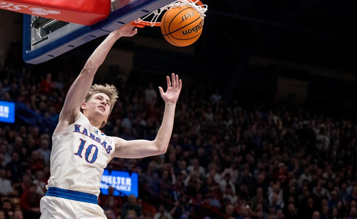 Kansas Jayhawks guard Johnny Furphy (10) dunks the ball against the BYU Cougars during an NCAA college basketball game on Tuesday, Feb. 27, 2024, in Lawrence.