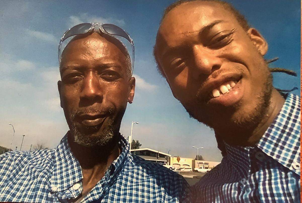 Anthony Garner, left, with his son Nicolas Gray