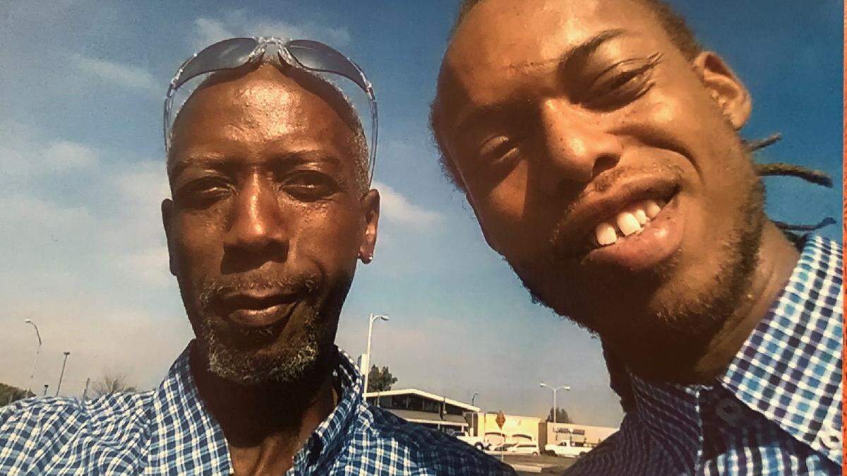 Anthony Garner, left, with his son Nicolas Gray