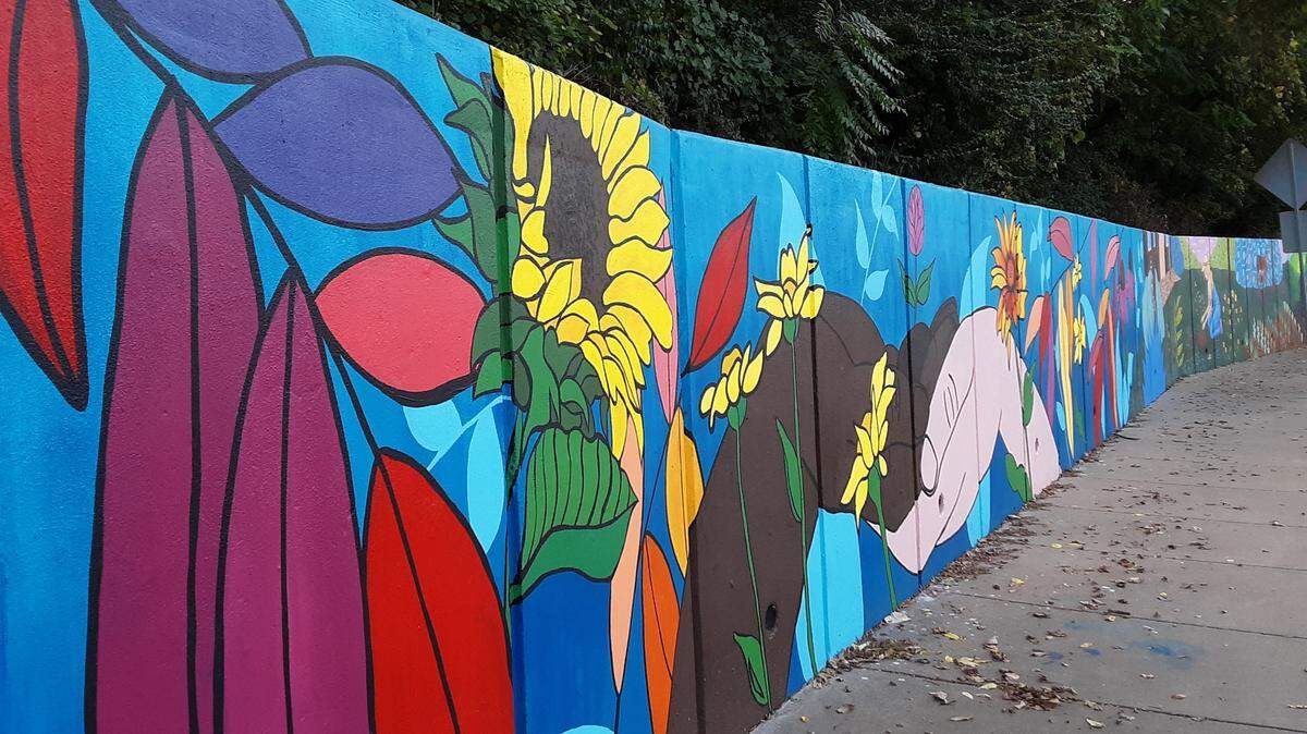 Eight artists collaborated on a colorful mural at 47th Street and Roe Lane in Roeland Park.