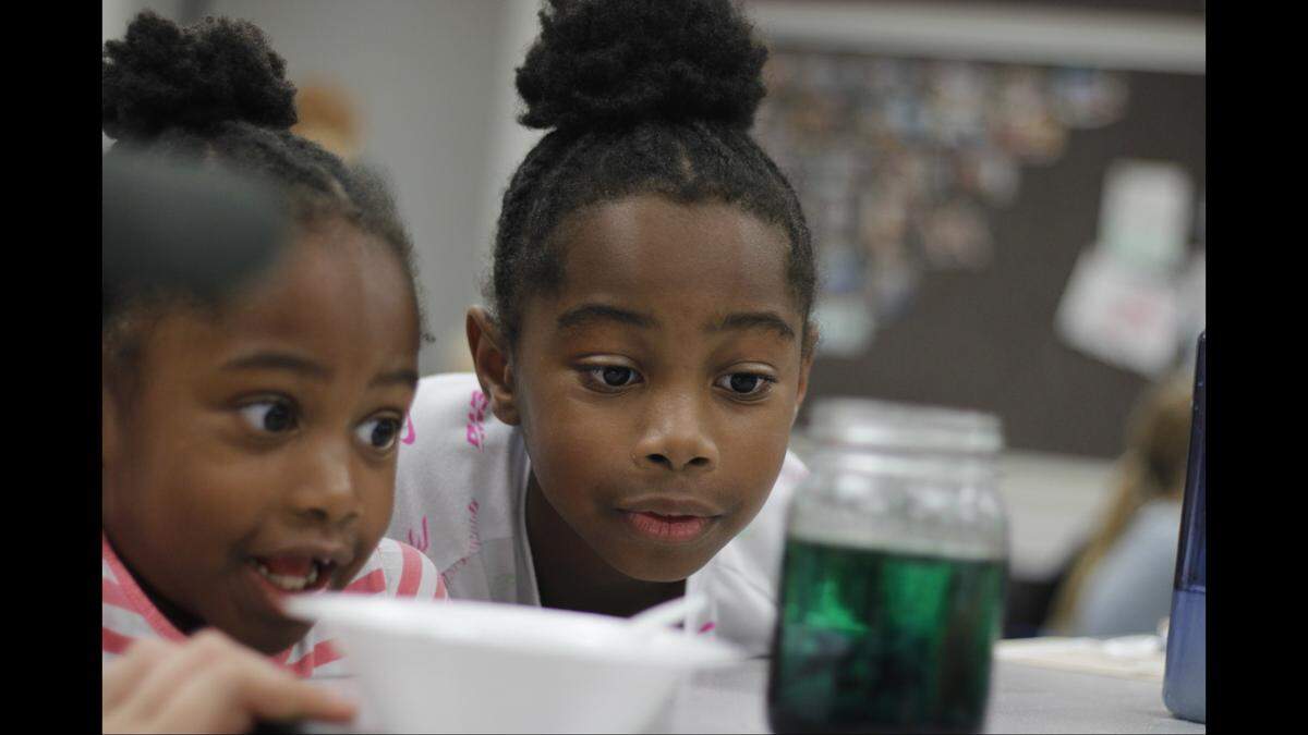 Sudents at a Lee’s Summit North robotics camp get enthusiastic about a science project.