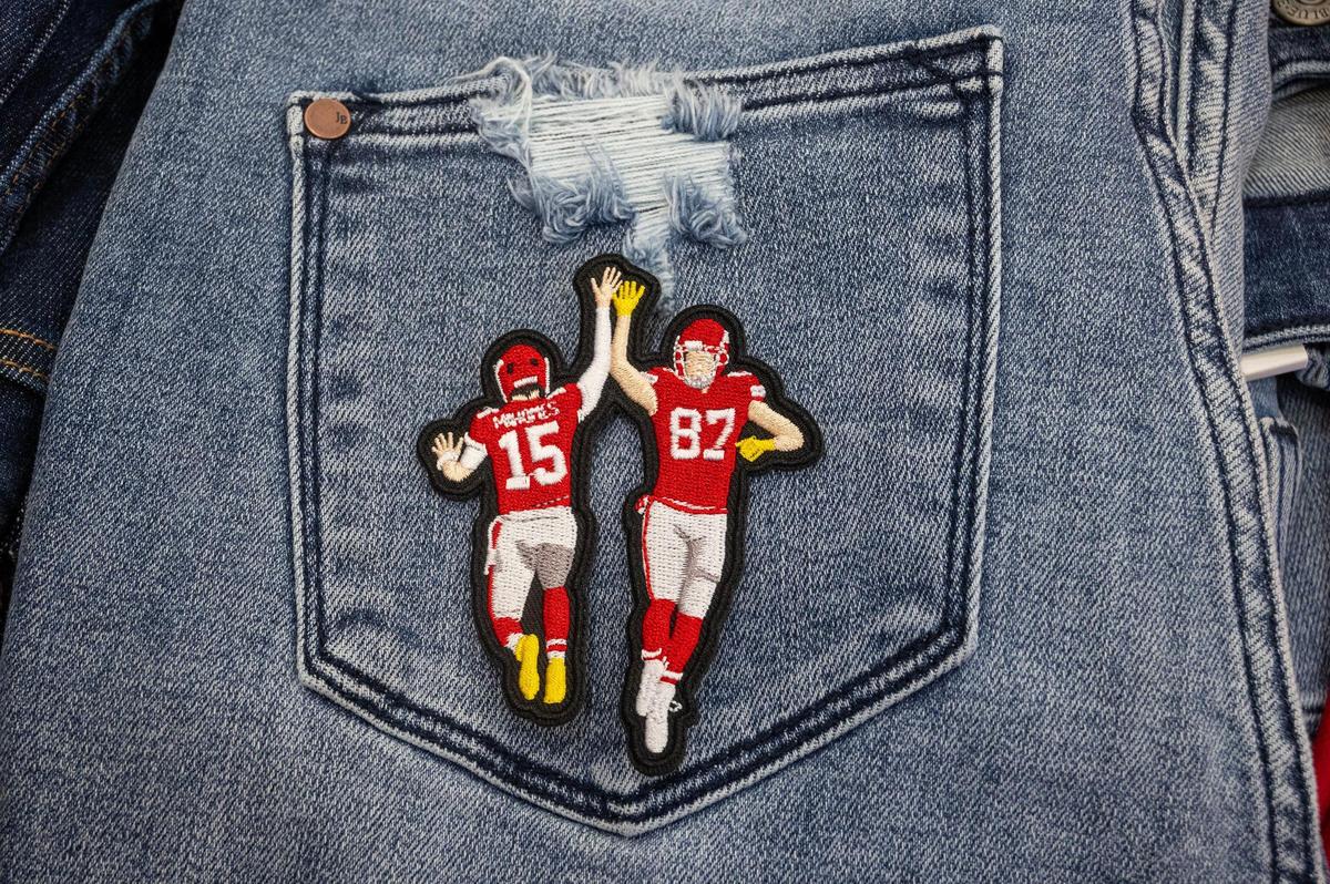 A popular patch designed by Melissa Wassergord, owner of Maxi Laine’s Boutique in Olathe, features Chiefs quarterback Travis Kelce and tight end Travis Kelce.
