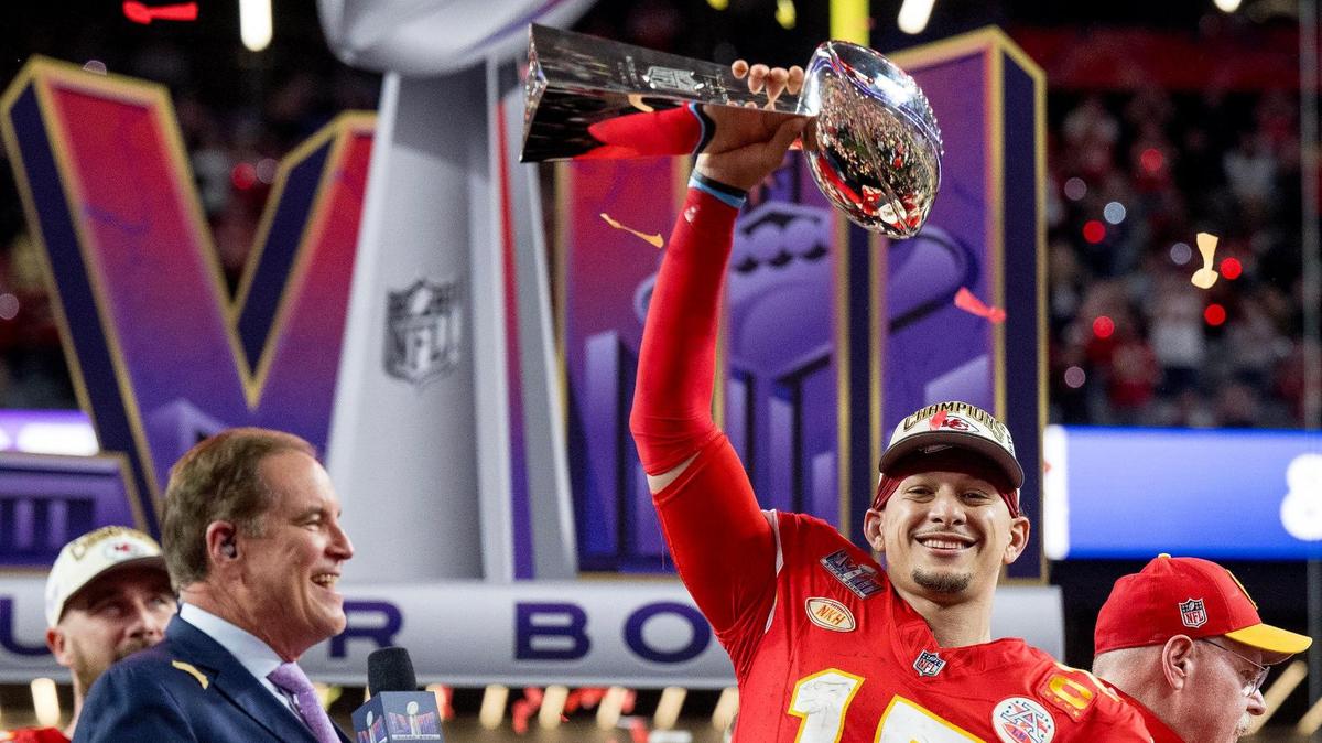Kansas City Chiefs quarterback Patrick Mahomes (15) hoists the Lombardi Trophy after the Chiefs defeated the San Francisco 49ers in overtime 25-22 in Super Bowl LVIII on Sunday, Feb. 11, 2024, in Las Vegas.