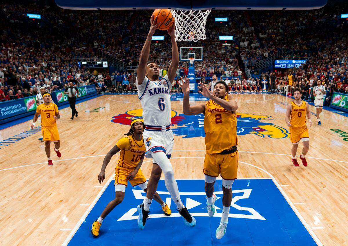 Kansas Jayhawks guard Rylan Griffen (No. 6) dunks the basketball during a home game against the Iowa State Cyclones at Allen Fieldhouse in Lawrence, Kansas, on Monday, Feb. 3, 2025.