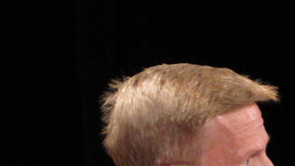 Scott Morgan ( left) Republican candidate for Kansas secretary of state, discusses his opposition to Kansas' proof-of-citizenship requirement for new voters, during a July 22 candidate forum in Ottawa. At right is his primary opponent, Secretary of State Kris Kobach, the architect of the rule. 