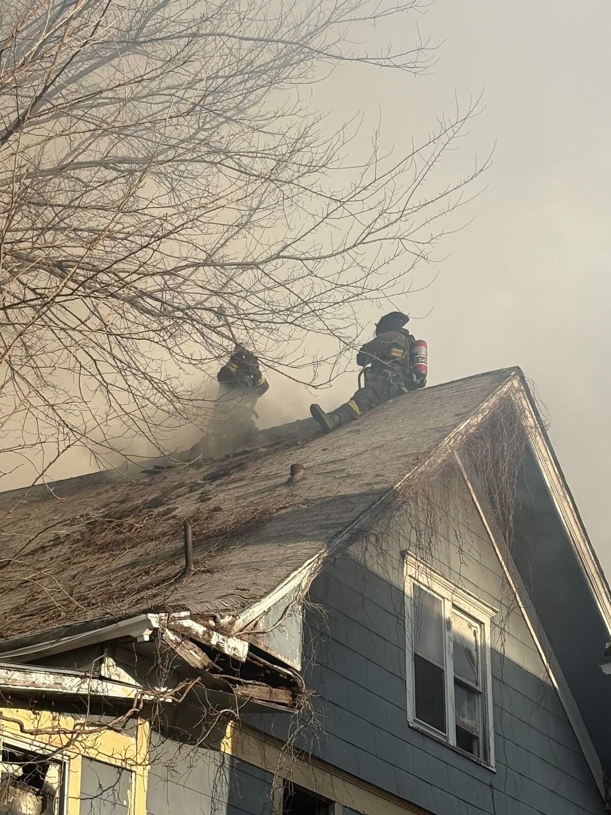 Firefighters battled a house fire Sunday morning in the 2700 block of East 27th Street in Kansas City. Arriving firefighters reported heavy fire coming from the second floor of a vacant, two-story home. The fire damaged neighboring properties.