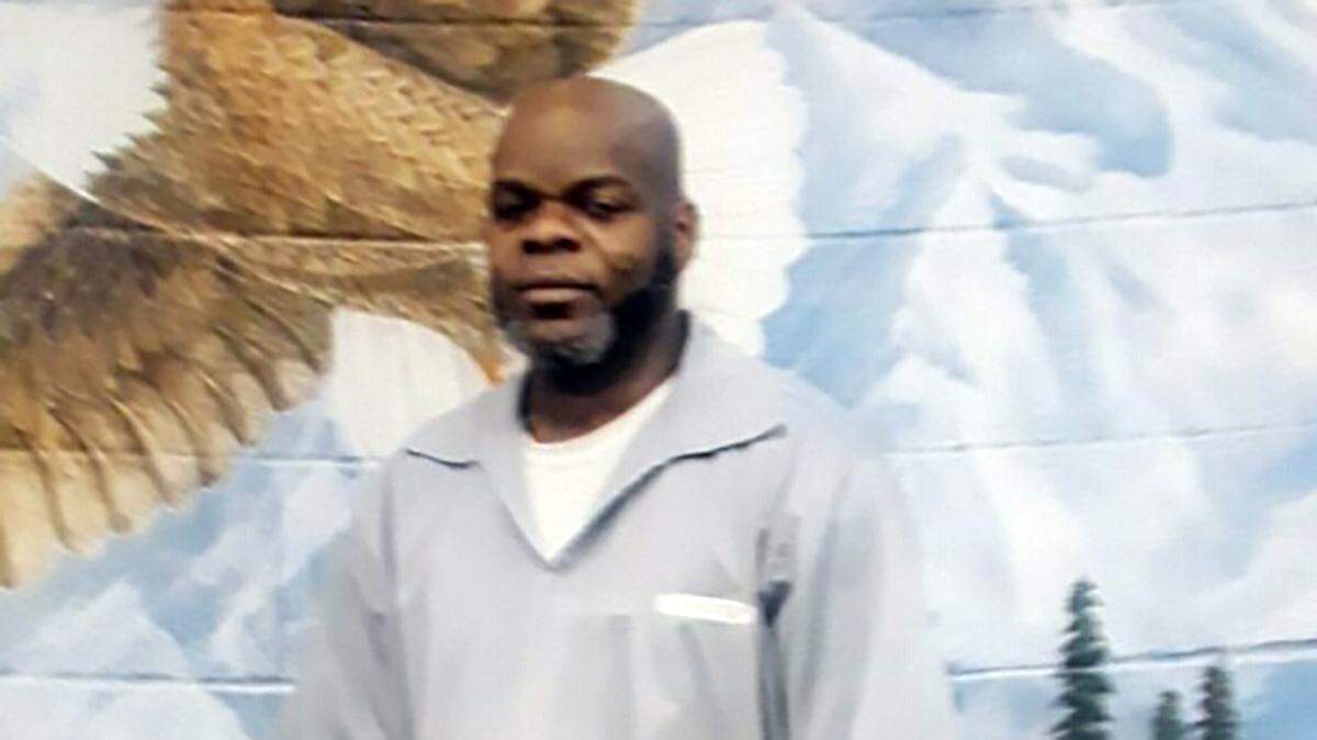 Michael Silas was among three men sent to prison for the 1991 murder of Raymond Thomas of Kansas City. 