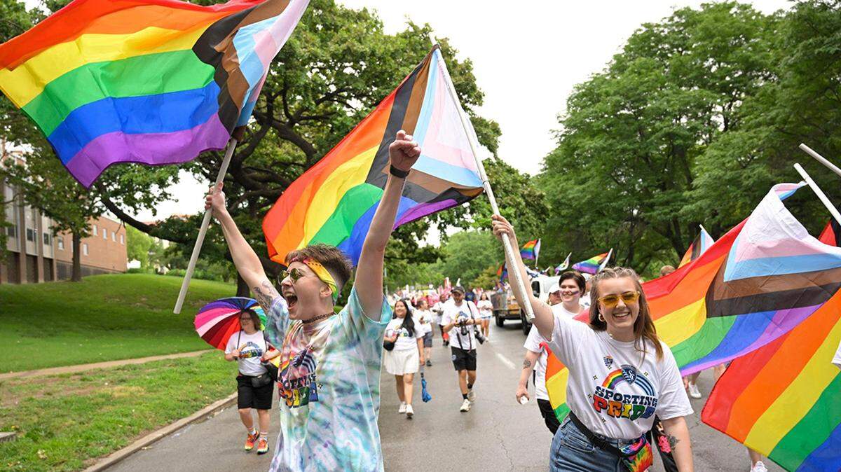 Maddie Anderson, left, and Jessi Carpenter celebrated during the 2023 KC Pride Parade.