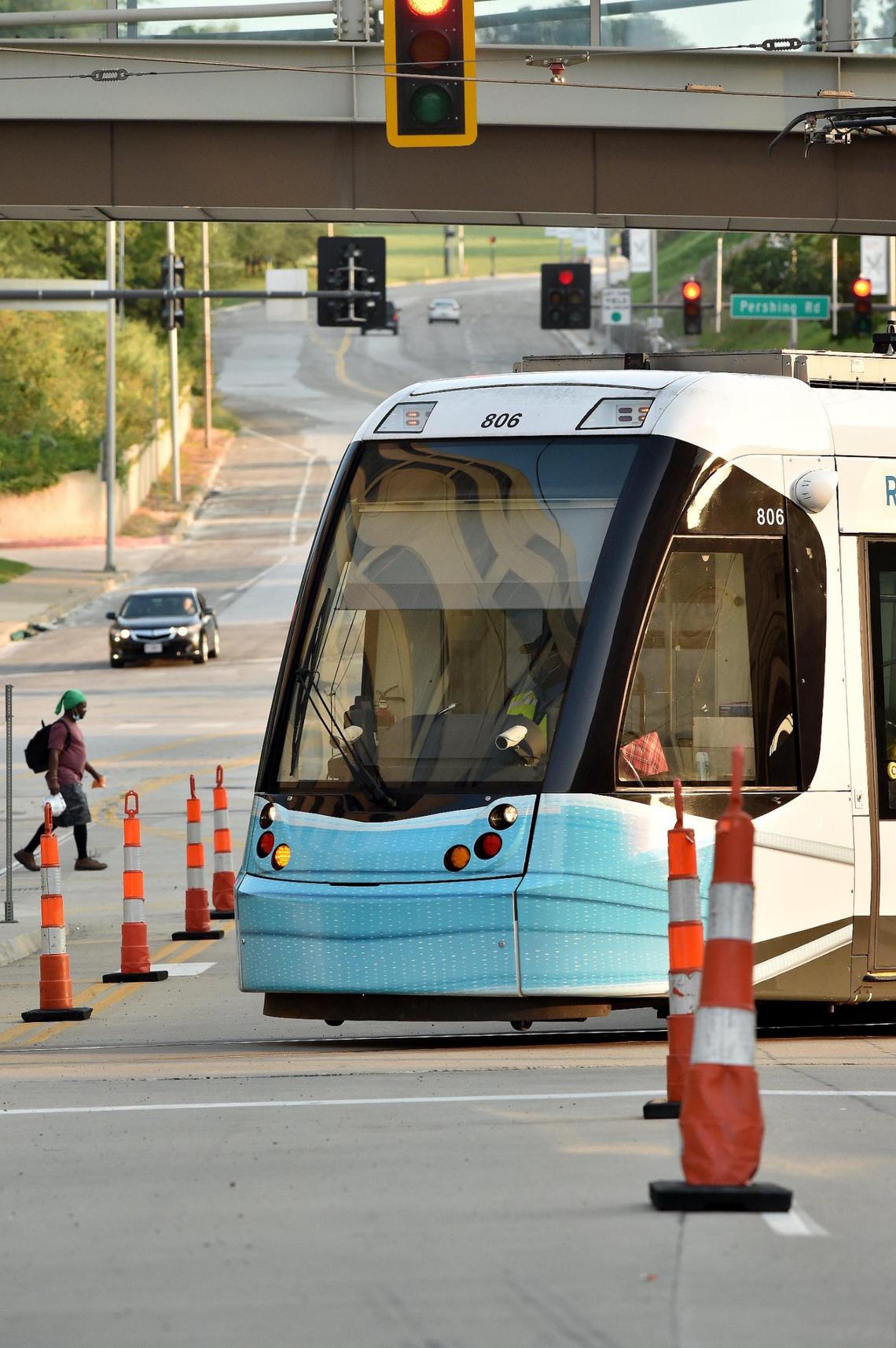 Keith Spare, a retired mental health counselor and program administrator and former president of South Plaza Neighborhood Association, fears the new taxes that will arise because the streetcar expansion will price people like him out of the neighborhood they’ve called home for years. Spare has an extensive garden that neighbors would drive by to check what’s blooming. Photographed in his back “secret garden,” he said, “If I had to move, I couldn’t take the garden with me.”