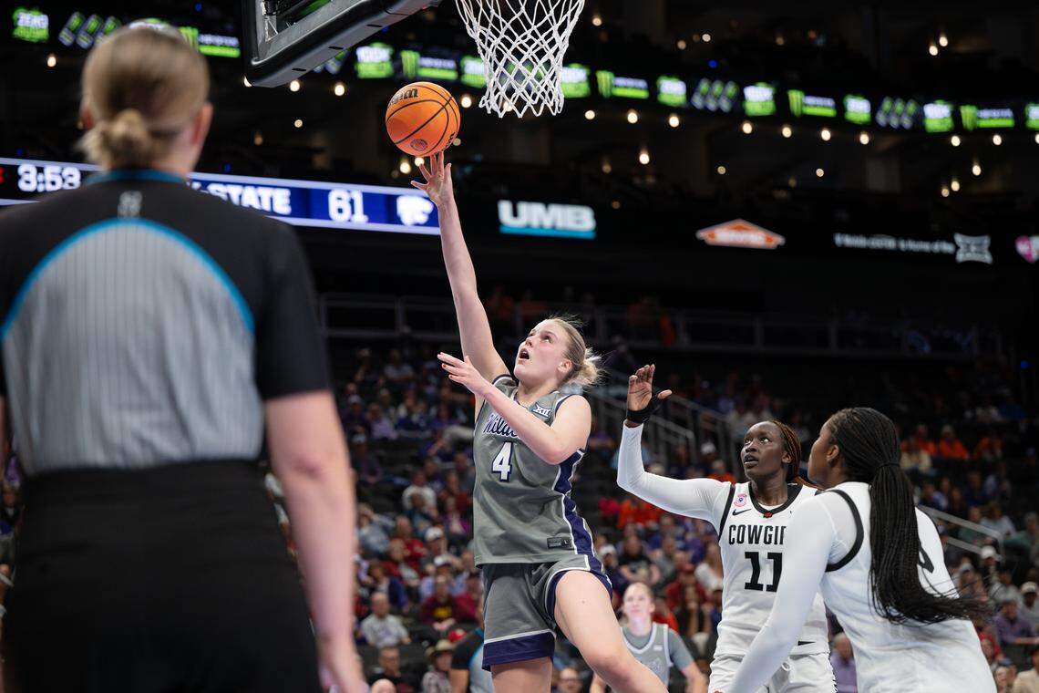 Kansas State Wildcats forward Nastja Claessens (4) makes a layup against Oklahoma State during the Big 12 Women’s Basketball Tournament at the T-Mobile Center.