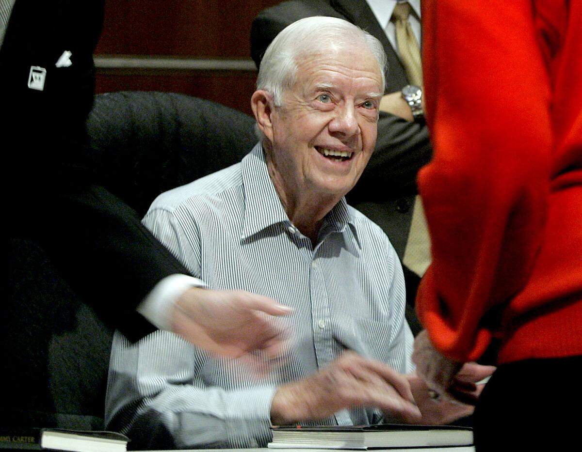 Jimmy Carter signed books at Unity Temple on the Plaza, sponsored by Rainy Day Books.