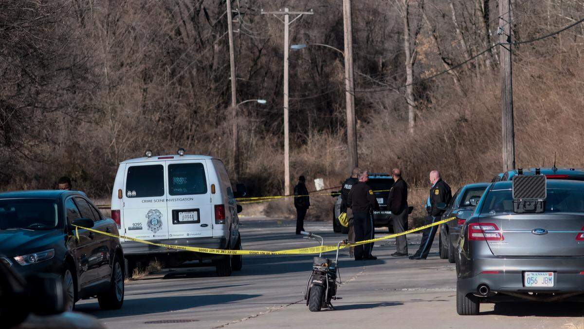 Police investigated after a badly burned body was found in a barrel Wednesday near 18th Street and Kansas 5 highway in Kansas City, Kansas.