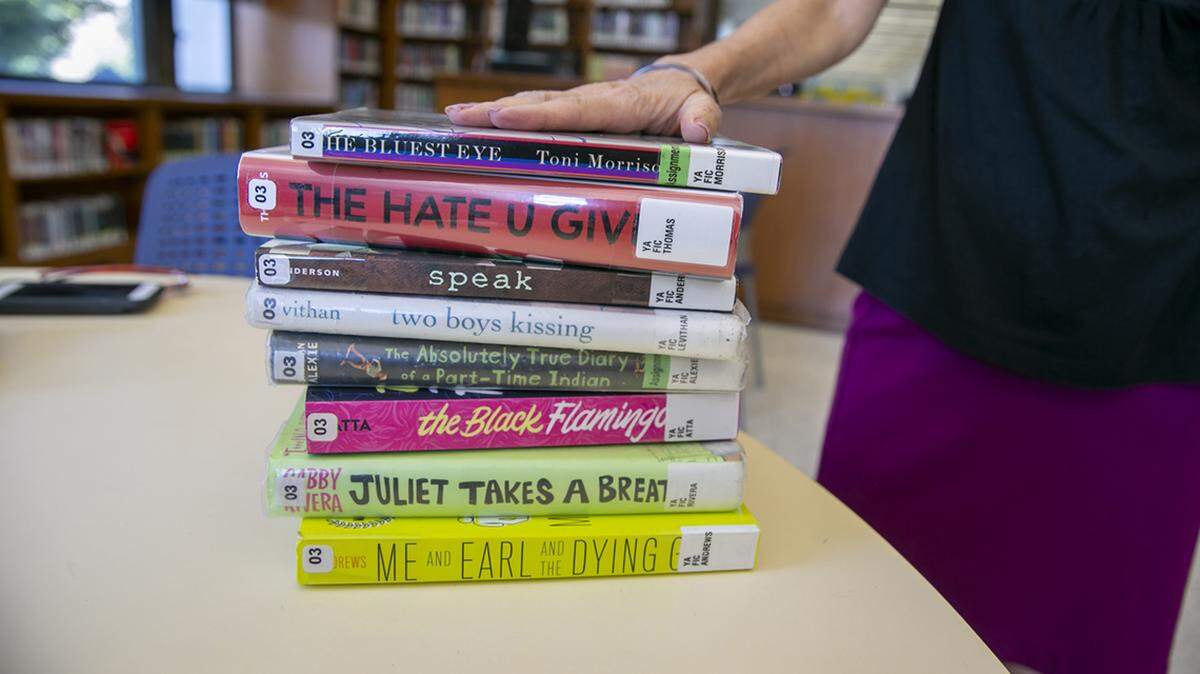 Banned books are visible at the Central Library, a branch of the Brooklyn Public Library system, in New York City on Thursday, July 7, 2022. The books are banned in several public schools and libraries in the U.S., but young people can read digital versions from anywhere through the library. The Brooklyn Public Library offers free membership to anyone in the U.S. aged 13 to 21 who wants to check out and read books digitally in response to the nationwide wave of book censorship and restrictions. (AP Photo/Ted Shaffrey)