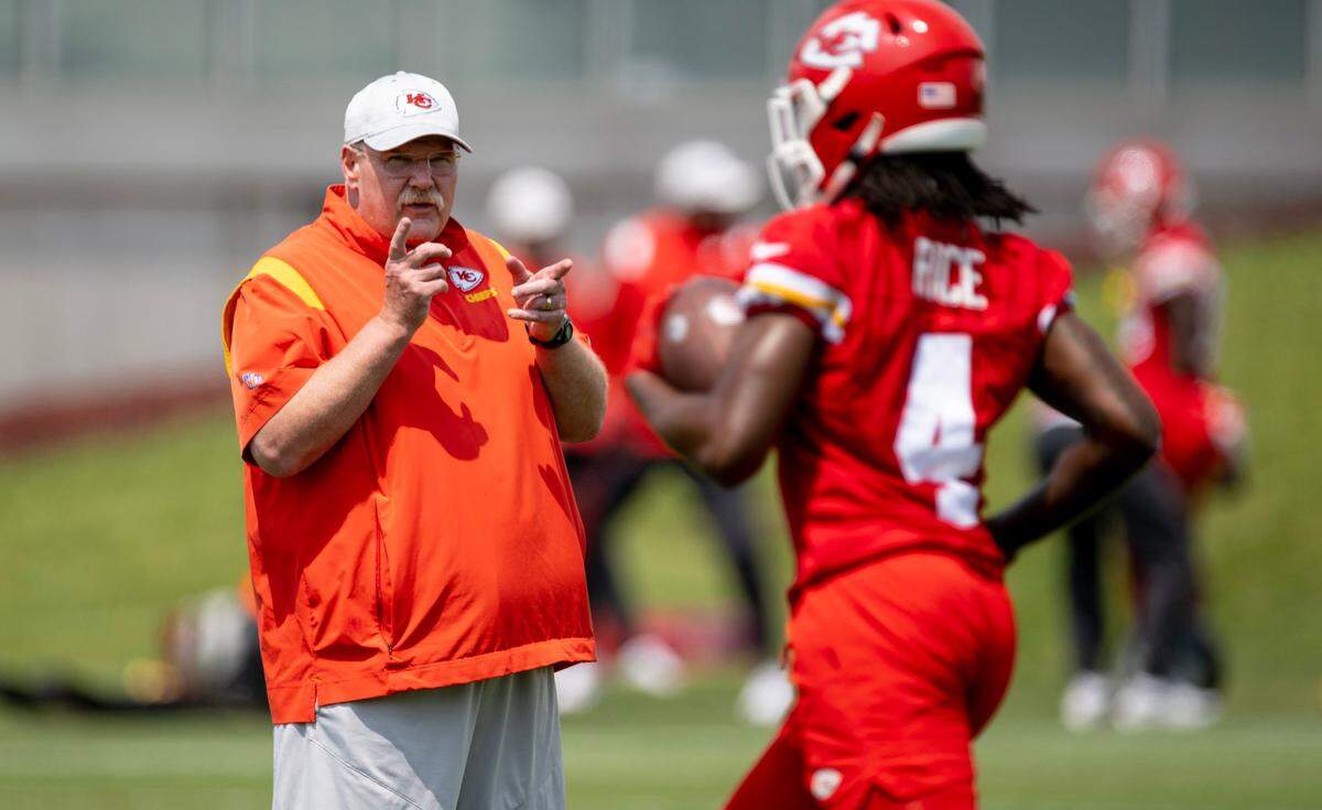 Kansas City Chiefs head coach Andy Reid talks to wide receiver Rashee Rice during a practice on Thursday, June 1, 2023, in Kansas City.