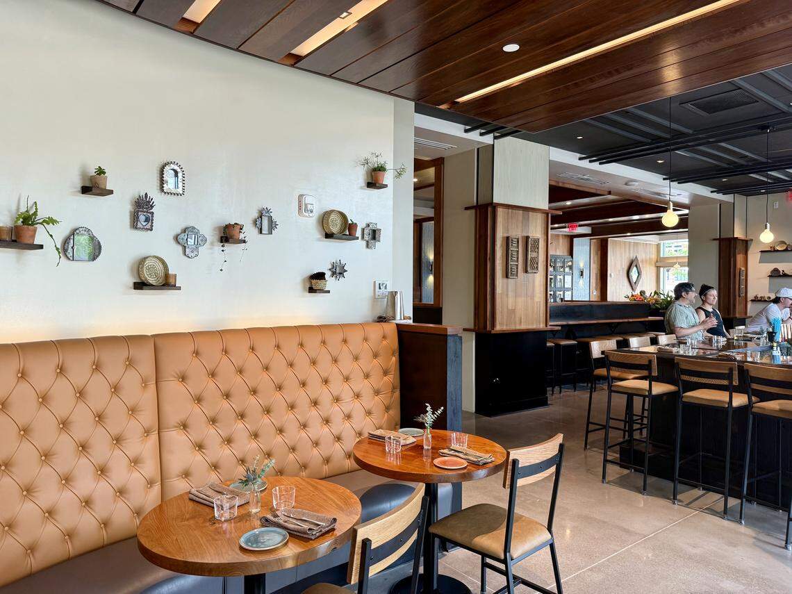 Customers can sit at the bar, at tables, or outside on the restaurant’s patio.