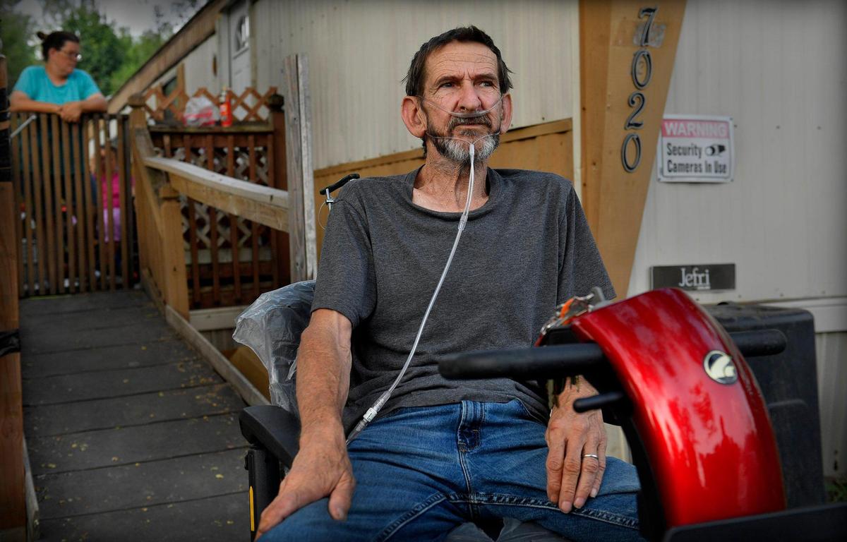 The county moved Urban Schaefer to a used mobile home in Excelsior Springs but hasn’t yet built a ramp for his electric scooter, which has been ruined by the elements.