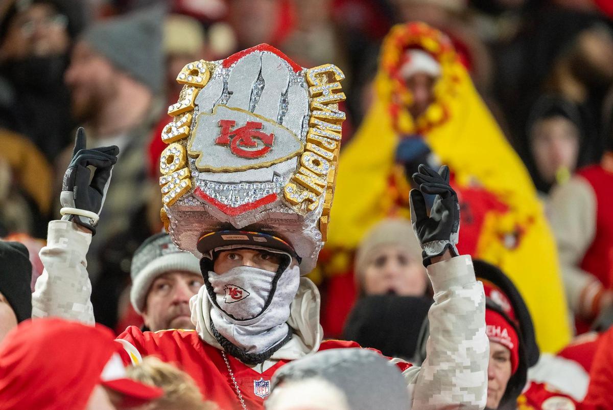 A Chiefs fan donned tan oversized Super Bowl-type ring in second half of the AFC Divisional Round playoff game on Saturday, Jan. 18, 2025, at GEHA Field at Arrowhead Stadium. The Chiefs defeated the Houston Texans 23-14.