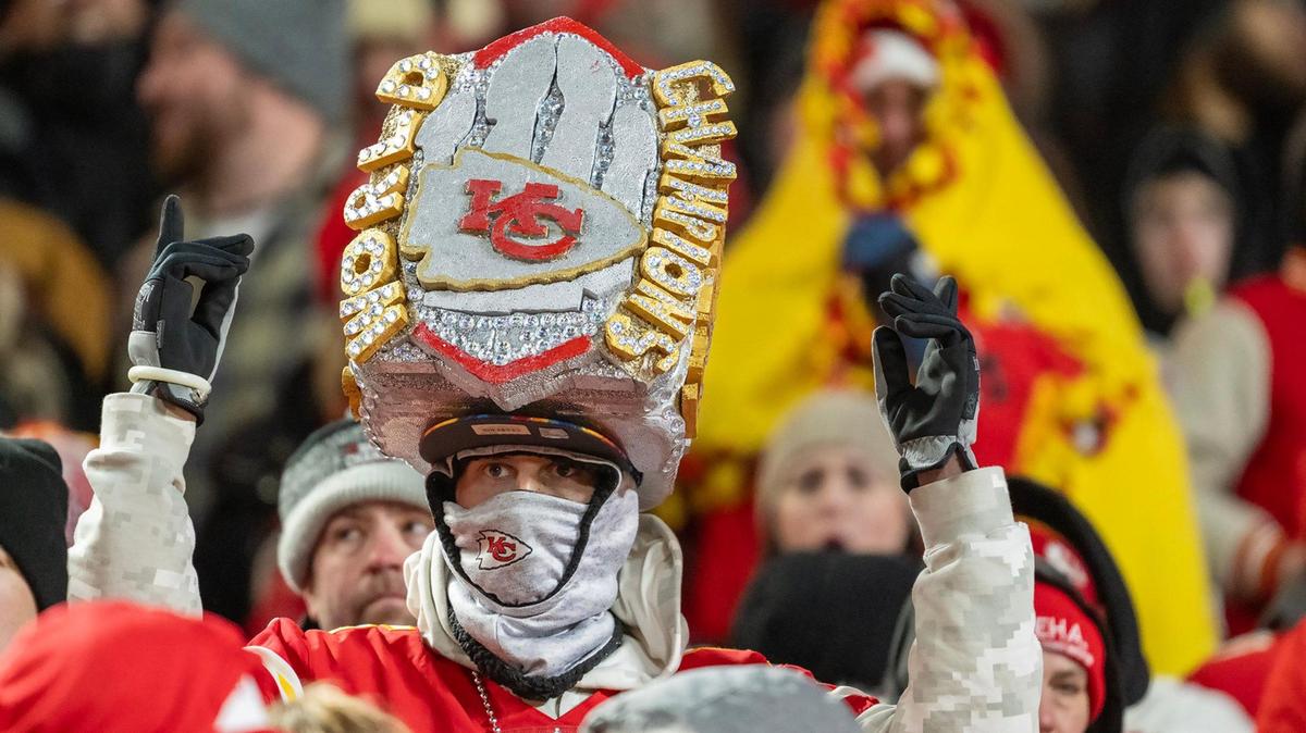 A Chiefs fan donned tan oversized Super Bowl-type ring in second half of the AFC Divisional Round playoff game on Saturday, Jan. 18, 2025, at GEHA Field at Arrowhead Stadium. The Chiefs defeated the Texans 23-14.
