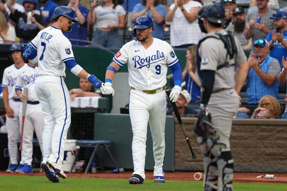 Bobby Witt Jr. #7 of the Kansas City Royals celebrates his home run with Vinnie Pasquantino #9 of the Kansas City Royals in the third inning against the New York Yankees at Kauffman Stadium on May 26, 2026 in Kansas City, Missouri.