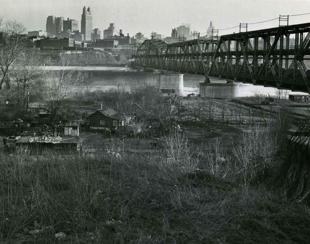 A view from Harlem from the 1960s looking across the Missouri River at downtown Kansas City. The Hannibal Bridge is on the right.