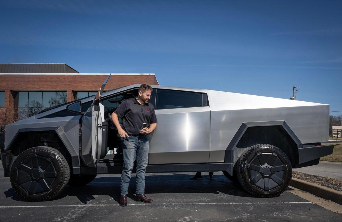 Jay O’Brien of Liberty stands along side the Tesla Cybertruck he put deposit on in 2019 and received in May, four and a half years later.