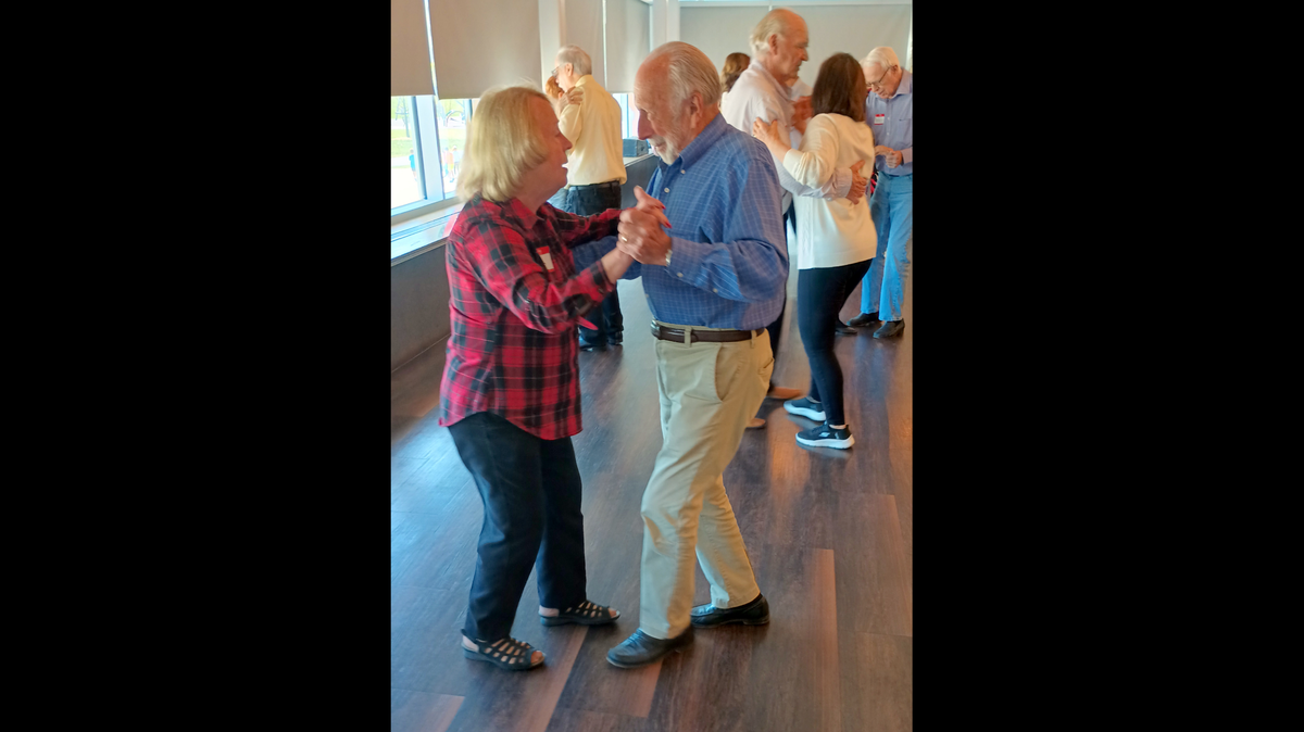 Ninety-five year old Nat Cassingham and his wife, June, dance ballroom at Meadowbrook Community Center. After their previous spouses died 16 years ago, they met in a grief support group.