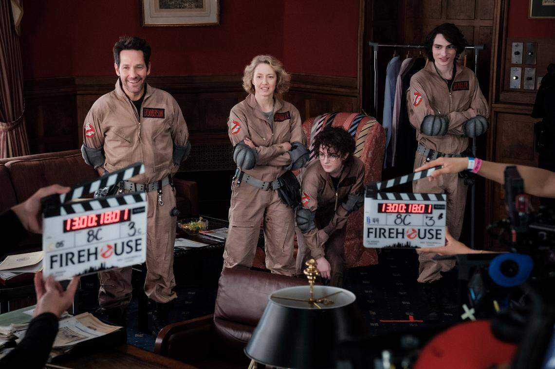 From left, Paul Rudd, Carrie Coon, Mckenna Grace and Finn Wolfhard, a new generation of ghostbusters, on the set of “Ghostbusters: Frozen Empire.”