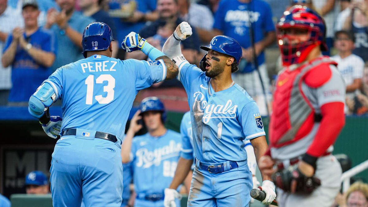 Kansas City Royals catcher Salvador Perez (13) celebrates with left fielder MJ Melendez (1) after hitting a home run against the St. Louis Cardinals during the second inning at Kauffman Stadium on August 11, 2023.