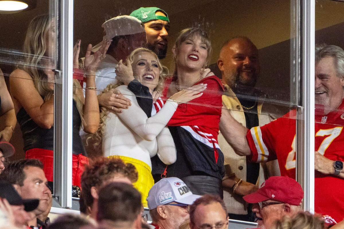 It was quite the night of hugging for Brittany Mahomes, left, and Taylor Swift as the Chiefs beat the Denver Broncos in October, 2023.