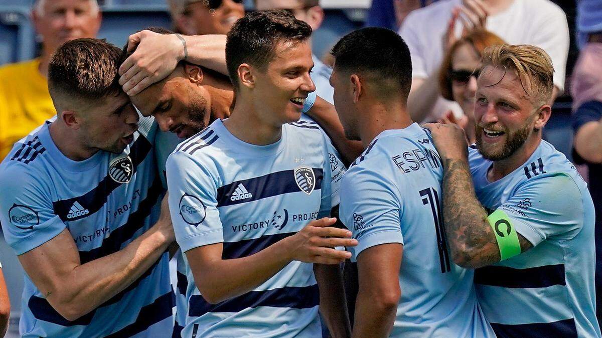 Sporting Kansas City players celebrated a goal by forward Daniel Salloi, center, against Austin FC on June 12. And they were celebrating a Salloi goal again Saturday against LAFC.