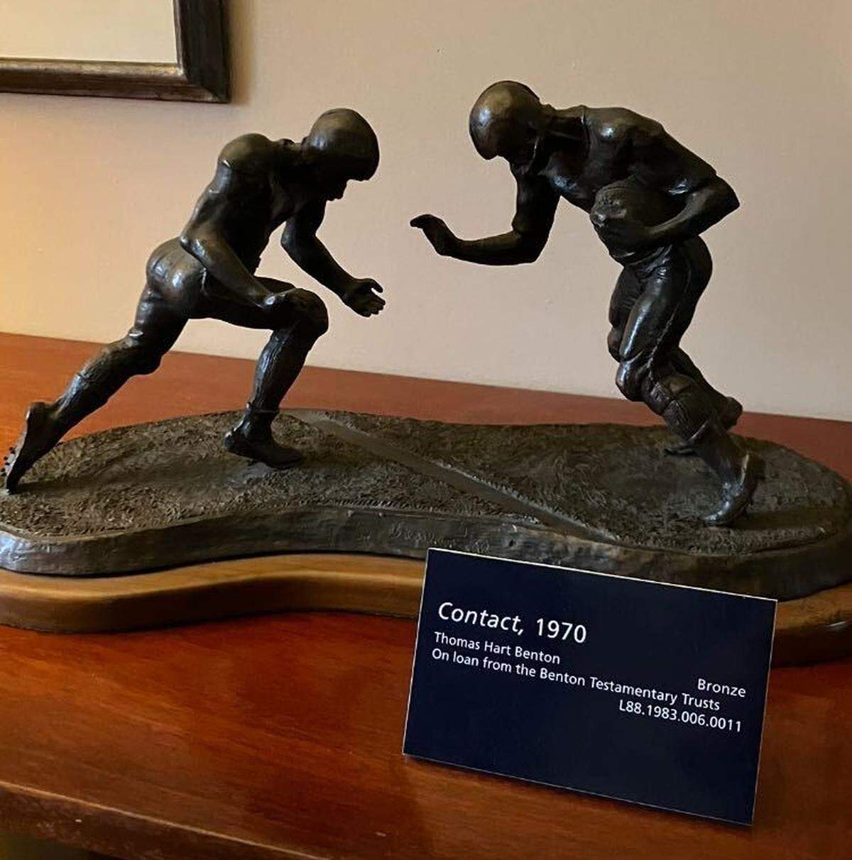 The sculpture “Contact” (1970) from Thomas Hart Benton, who became enamored with football after his experience at a Kansas City Chiefs game.