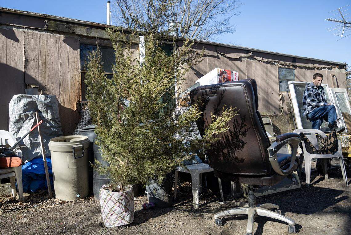 Charles “Jody” Andula and his 13-year-old son, Airen, cut down the evergreen tree together the day before Airen died. “The last thing we did with him, that Saturday, was take him to cut down our Christmas tree,” said Anita Gun, Airen's mother. “He had never seen that done before, so it really thrilled him.” The tree remains in a bucket outside the family home where Andula spoke on Monday, Jan. 12, 2026. 