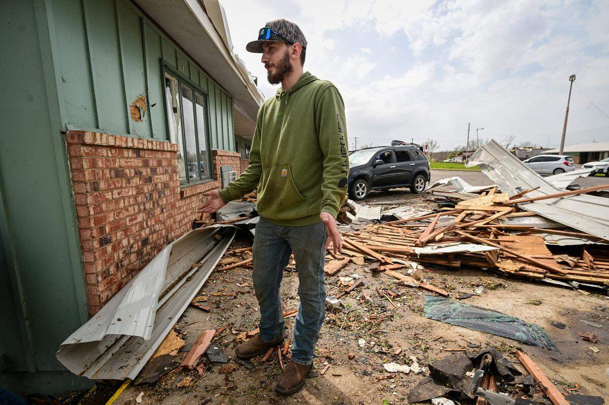 Riley Worthen, a welding student from Keen, New Hampshire, says he got into a bathtub with two friends and prayed while taking cover from a tornado that heavily damaged The Oaks student housing center Wednesday, April 2, 2025, in Nevada, Missouri.
