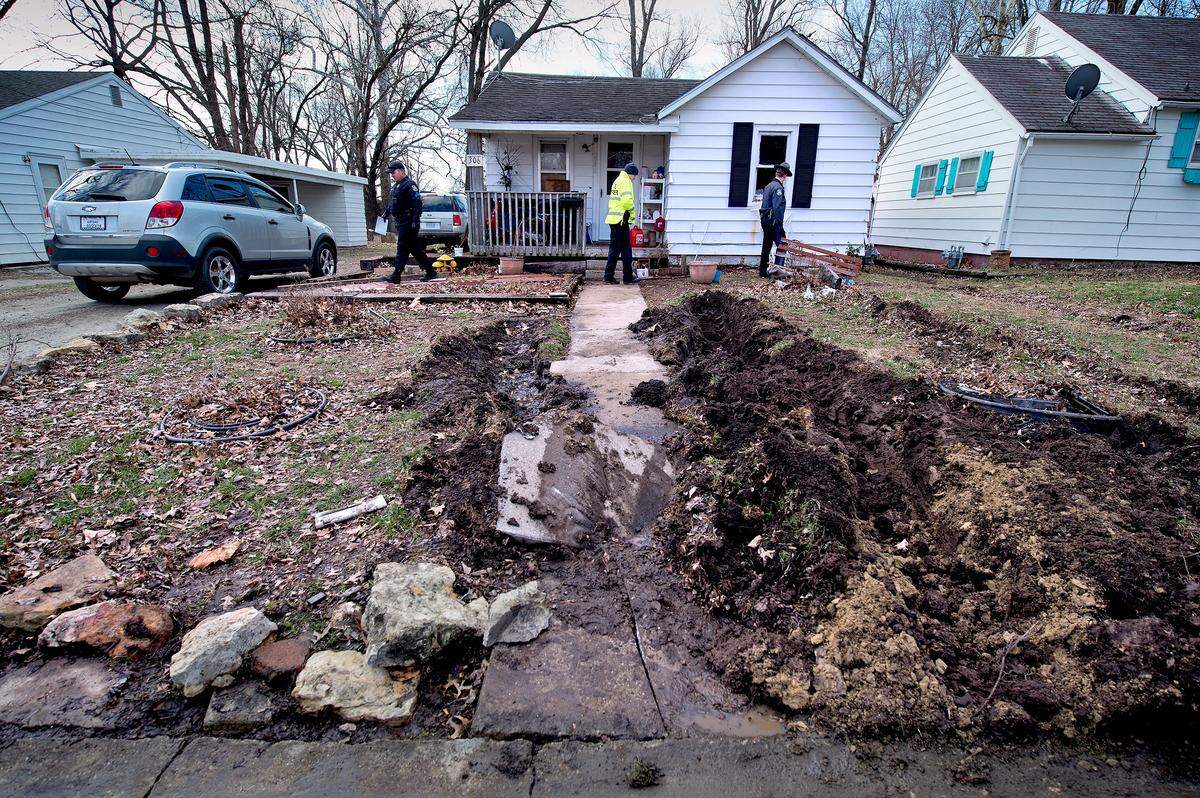 Three officers were shot at 306 W. Grandriver, Clinton, Mo.