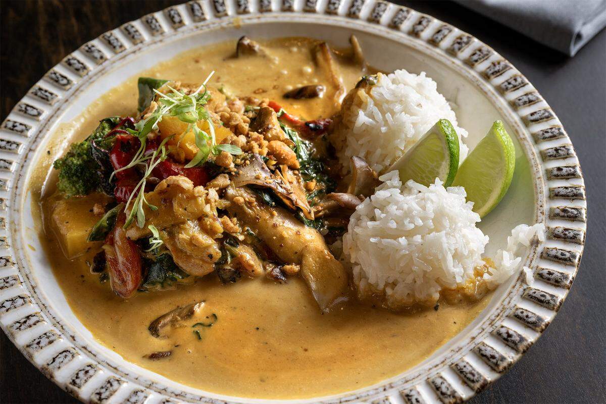 The Seasonal Coconut Curry, a dish at Gram & Dun which opened Wednesday, Jan. 21, 2026, at the Argosy Casino & Hotel in Riverside, Missouri. The $26 dish features jasmine rice, swiss chard, wild mushrooms, roasted red bell pepper, broccoli florets, winter squash, spiced peanuts, micro cilantro. 