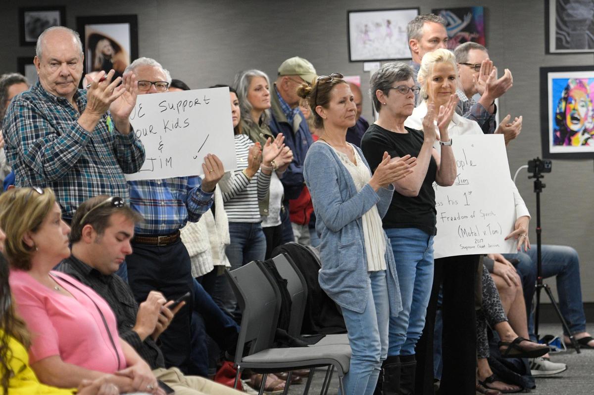 A crowd packed the Blue Valley school board chambers on Thursday, many there to support member Jim McMullen, who has been under fire for his views on LGBTQ issues.