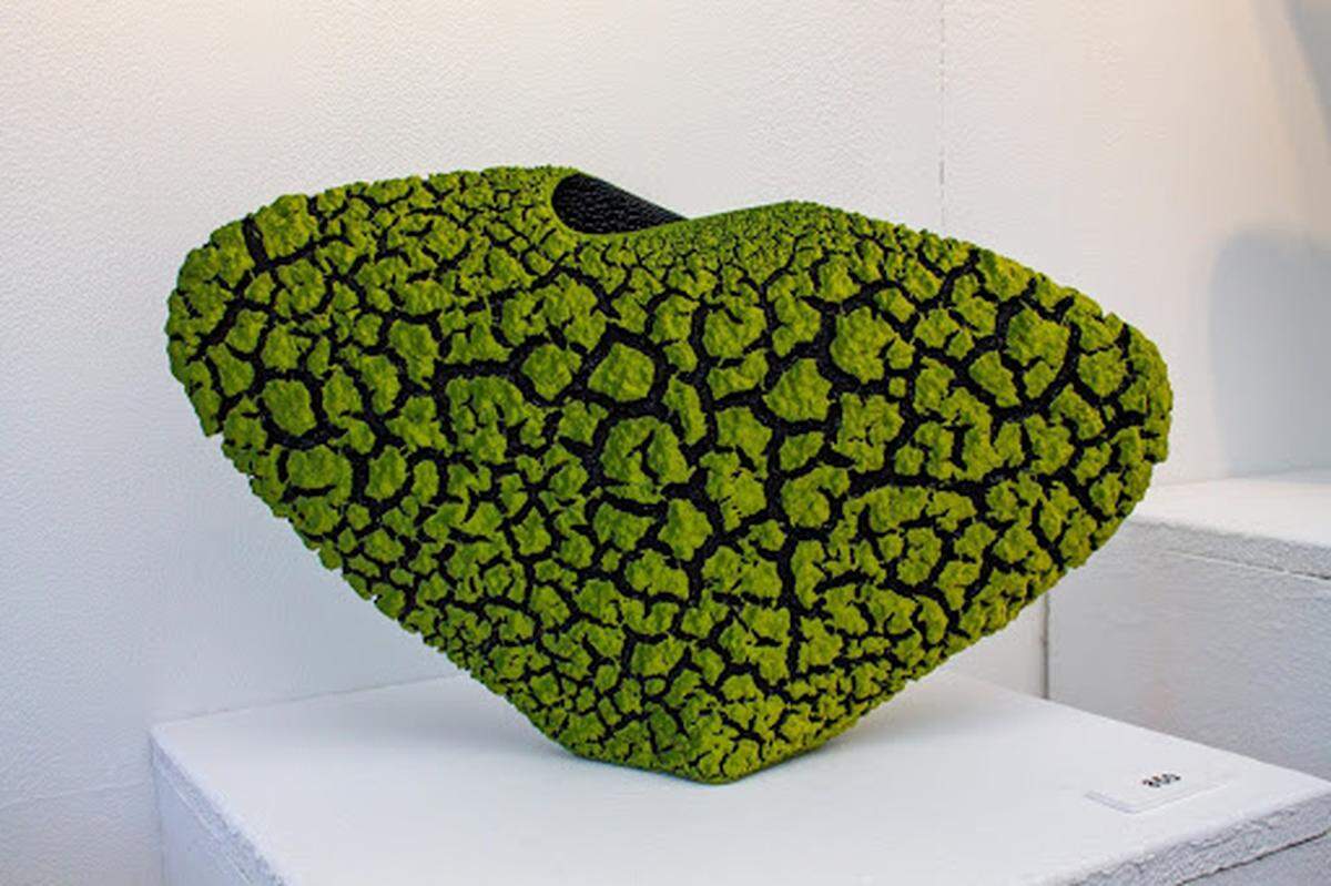 Randy O’Brien has honed his formula for cracked, textured glazes over years.