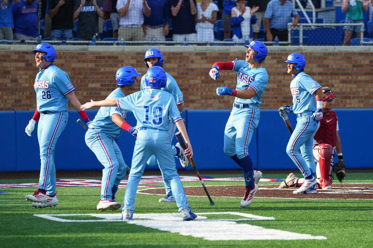 Jayhawks infielder Tyson LeBlanc (2) celebrates after hitting a three-run homer in the fourth inning during an NCAA baseball tournament game against the Arkansas Razorbacks at Hoglund Ballpark on Sunday, May 31st, 2026, in Lawrence.